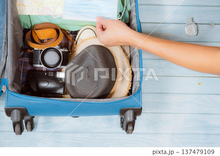 top view with cloth and accessories prepare in luggage for travel with new normal style support autumn season 137479109