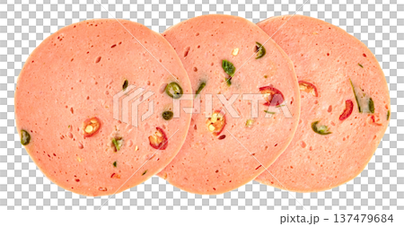 Three slices of spicy bologna sausage with pieces of red and green chili pepper embedded.Top view of gourmet deli meat for sandwiches and snack platters. Three slices of spicy bologna sausage with pieces of red and green chili pepper embedded.Top view of gourmet deli meat for sandwiches and snack platters. 137479684