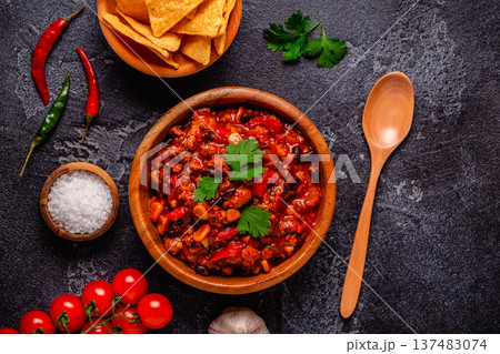 Chili Con Carne in bowl on dark background. 137483074