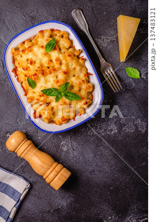 American mac and cheese, macaroni pasta in cheesy sauce American mac and cheese, macaroni pasta in cheesy sauce 137483121