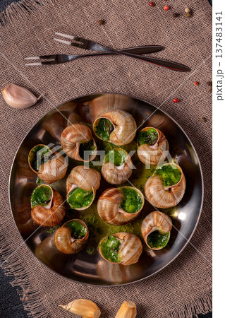 Bourgogne Escargot Snails with herb garlic oil. Bourgogne Escargot Snails with herb garlic oil. 137483141
