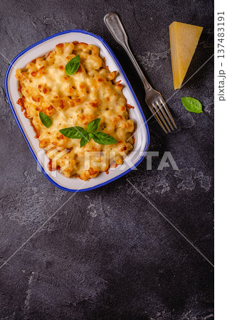 American mac and cheese, macaroni pasta in cheesy sauce 137483191