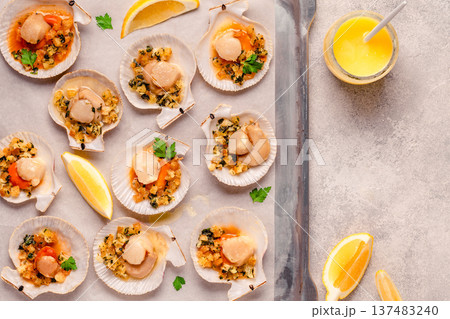 Cooked scallops with sauce Cooked scallops with sauce 137483240