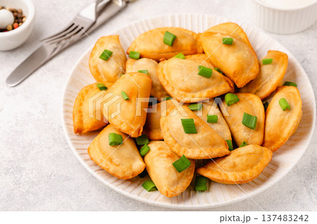 Dumplings, filled with mashed potatoes. Dumplings, filled with mashed potatoes. 137483242