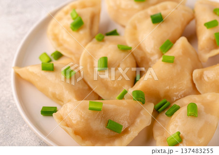 Dumplings, filled with mashed potatoes. 137483255