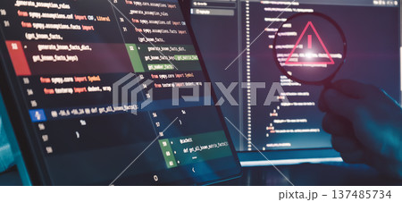 Code Error Detection and Software Debugging Concept with Warning Symbol in Magnifying Glass on Programming Screens Code Error Detection and Software Debugging Concept with Warning Symbol in Magnifying Glass on Programming Screens 137485734