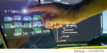 Programmer Hand Interacting with Code and Flow Diagram Overlay on Touchscreen in Futuristic Software Workspace Programmer Hand Interacting with Code and Flow Diagram Overlay on Touchscreen in Futuristic Software Workspace 137485745