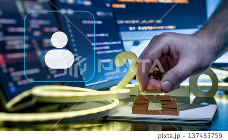 AI User Profile and Cloud Setup Concept with 2026 Desk Scene, Coding Screens and Hand Building Digital Structure 137485759