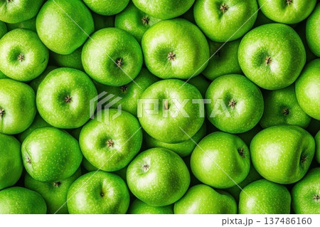 Vibrant Green Apples Displayed in Full Screen with Fresh Natural Texture 137486160