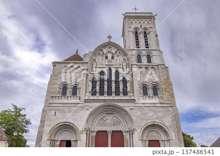 Vezelay basilica showcasing its elaborate Romanesque facade under a cloudy sky 137486541
