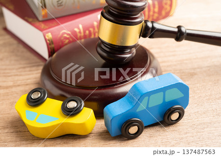 Car accident lawsuit and insurance, Judge hammer with car model. 137487563