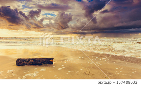 Beatiful sunset with clouds over sea and beach Beatiful sunset with clouds over sea and beach 137488632