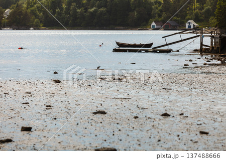 Old boat on lake shore coast Old boat on lake shore coast 137488666