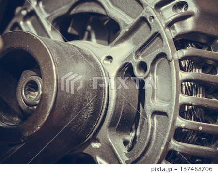 Detailed closeup of alternator generator machine engine Detailed closeup of alternator generator machine engine 137488706
