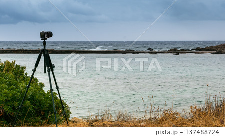 Camera taking picture film of sea coast 137488724