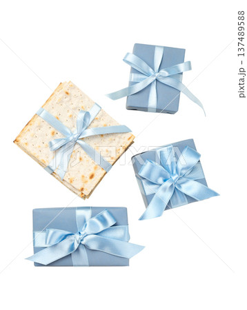 Passover gifts and matzah are arranged with ribbons, isolated, PNG Passover gifts and matzah are arranged with ribbons, isolated, PNG 137489588