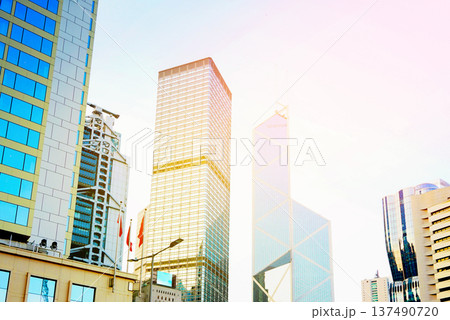 Skyscrapers in bright glass exteriors sunlight on sunset. Modern facade office buildings 137490720