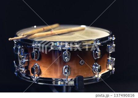 Drum close-up. Drumsticks with a drum. 137490816
