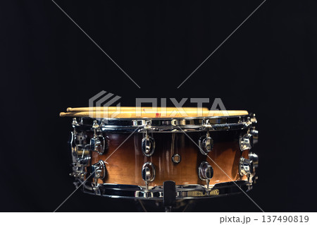 Drum close-up. Drumsticks with a drum. 137490819