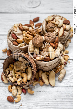 different nuts in a plate closeup different nuts in a plate closeup 137490980