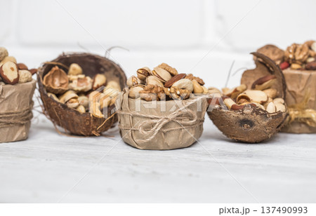 different nuts in a plate closeup different nuts in a plate closeup 137490993