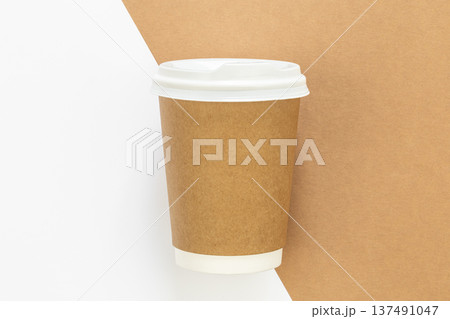 Craft paper coffee cup, flat lay, close up. 137491047