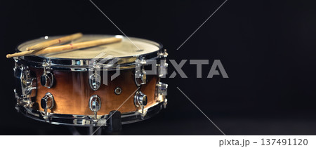 Drum close-up. Drumsticks with a drum. Drum close-up. Drumsticks with a drum. 137491120