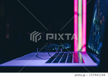 Stock market graph, financial data on an electronic board on a laptop screen. Stock market graph, financial data on an electronic board on a laptop screen. 137491148