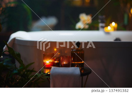 Candlelit Home Spa Accessories by a Freestanding Bathtub Candlelit Home Spa Accessories by a Freestanding Bathtub 137491382