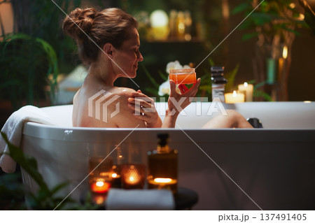 Tranquil Skincare Ritual in a Candlelit Bath Tranquil Skincare Ritual in a Candlelit Bath 137491405