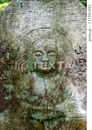 Monk statue in serene Mitaki-Dera temple garden in Hiroshima Monk statue in serene Mitaki-Dera temple garden in Hiroshima 137491891