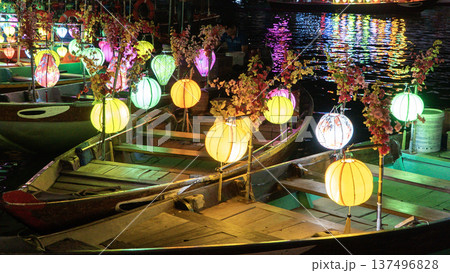 Colorful lanterns on boat at night in Hoi An, Vietnam traditional festival lights on river 137496828