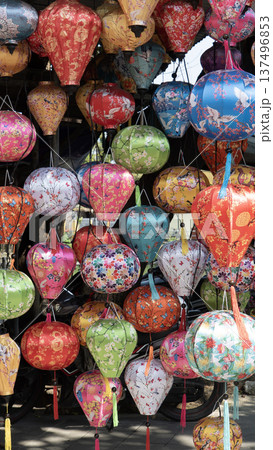 Colorful lanterns glowing at night in Hoi An, Vietnam traditional lantern festival street lights Colorful lanterns glowing at night in Hoi An, Vietnam traditional lantern festival street lights 137496853