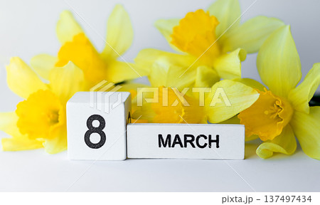 Eight March calendar cube with yellow daffodil in a bright spring bouquet scene vibrant composition 137497434