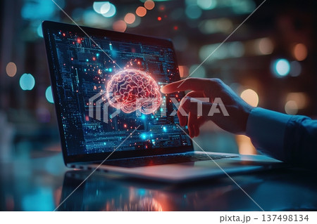 Futuristic brain interface depicted on a laptop screen highlighting digital neural network concept 137498134