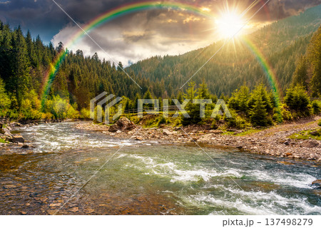 sunset over landscape with mountain, forest and a river in front. beautiful scenery of the green valley during spring. scenic alpine environment for remote outdoor adventure under the rainbow sunset over landscape with mountain, forest and a river in front. beautiful scenery of the green valley during spring. scenic alpine environment for remote outdoor adventure under the rainbow 137498279