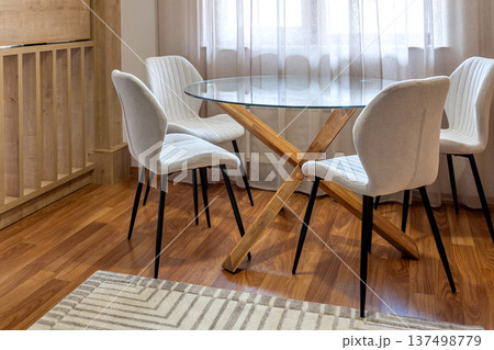 dining area with round glass table 137498779