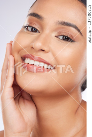 Beauty, makeup and happy and portrait of woman in studio for cosmetics, glow and self care. Health, skincare and dermatology with person on white background for facial, salon and cosmetology Beauty, makeup and happy and portrait of woman in studio for cosmetics, glow and self care. Health, skincare and dermatology with person on white background for facial, salon and cosmetology 137500215