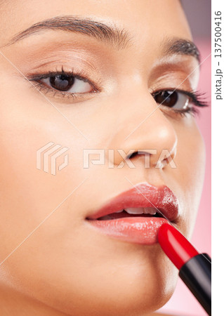 Beauty, makeup and portrait of woman with lipstick for cosmetics, skincare products and salon. Luxury, fashion aesthetic and face zoom of person in studio background for cosmetology, glamour or gloss Beauty, makeup and portrait of woman with lipstick for cosmetics, skincare products and salon. Luxury, fashion aesthetic and face zoom of person in studio background for cosmetology, glamour or gloss 137500416