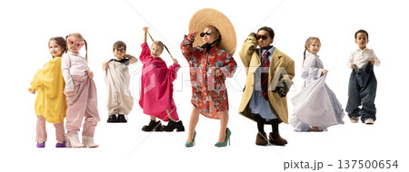 Group of children wearing oversized fashion outfits posing confidently, symbolizing creativity, childhood imagination Group of children wearing oversized fashion outfits posing confidently, symbolizing creativity, childhood imagination 137500654