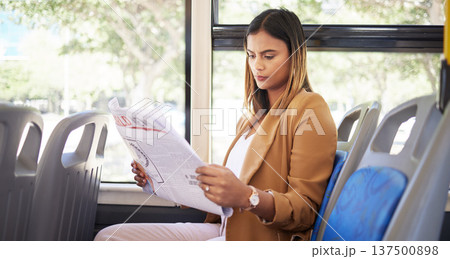 Woman on a bus, transportation and travel with newspaper, commute to work or university, city and traffic. Transportation, vehicle and student, trip and reading material with metro and public service Woman on a bus, transportation and travel with newspaper, commute to work or university, city and traffic. Transportation, vehicle and student, trip and reading material with metro and public service 137500898