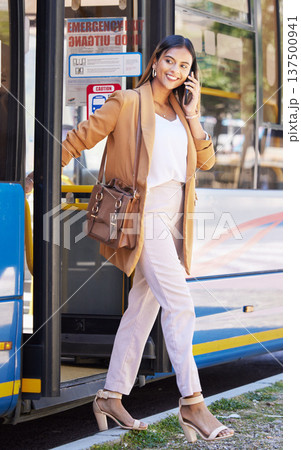 Travel, phone call and happy woman at the bus stop, public transport service and person chat on commute to work. Corporate, worker or talking on cellphone with connection or transportation on metro 137500941