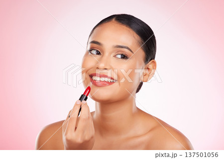 Lipstick, mockup and face of happy woman with makeup or cosmetics on pink background space and thinking about product. Lips, beauty and model with ideas for skincare or choice of red color on mouth Lipstick, mockup and face of happy woman with makeup or cosmetics on pink background space and thinking about product. Lips, beauty and model with ideas for skincare or choice of red color on mouth 137501056