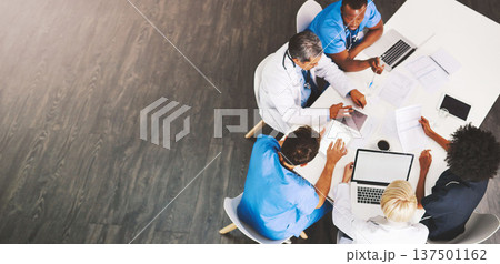 Hospital, meeting and doctors with nurses, laptop or tablet from above for surgery, advice or planning. Healthcare, teamwork or people in office for help, collaboration or results, review or analysis 137501162