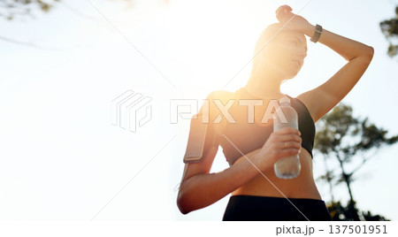 Nature mockup, running or woman drinking water in park after training, workout or exercise to hydrate. Sunshine, fitness space or tired girl with bottle for healthy liquid hydration on resting break Nature mockup, running or woman drinking water in park after training, workout or exercise to hydrate. Sunshine, fitness space or tired girl with bottle for healthy liquid hydration on resting break 137501951
