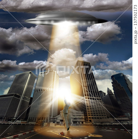 UFO, spaceship and alien abduction in street, man victim and tractor beam for horror, search or light. UAP ship, flying saucer and lights in dark cityscape, metro or cbd for fantasy, flight or person UFO, spaceship and alien abduction in street, man victim and tractor beam for horror, search or light. UAP ship, flying saucer and lights in dark cityscape, metro or cbd for fantasy, flight or person 137502173