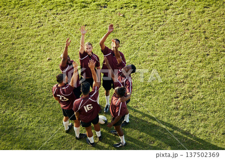 Raised hand, sports and rugby people celebrate teamwork, team building or winning game, match or tournament competition. Success motivation, top view winner and circle of men happy, excited or cheers 137502369