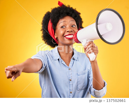 Woman, megaphone and winner choice in announcement, broadcast and choice or news on yellow background. African person pointing you, attention and communication with sale, bonus or winning in studio Woman, megaphone and winner choice in announcement, broadcast and choice or news on yellow background. African person pointing you, attention and communication with sale, bonus or winning in studio 137502661