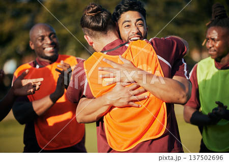 Hug, sports and rugby team celebrate teamwork, achievement or winning game, match or tournament competition. Embrace, group winner celebration and men happy, excited or applause for challenge success 137502696