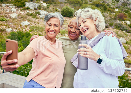 Senior friends, fitness or selfie of women on social media together for outdoor exercise in retirement. Photo, diversity or happy elderly people hiking to take pictures on break in training in park Senior friends, fitness or selfie of women on social media together for outdoor exercise in retirement. Photo, diversity or happy elderly people hiking to take pictures on break in training in park 137502783